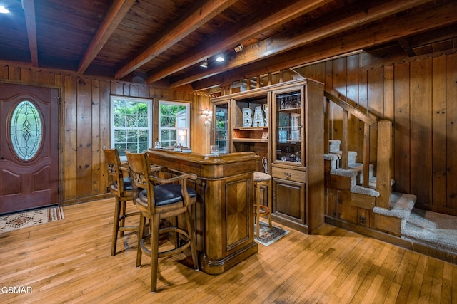 204 Hill St, Gatlinburg, TN 37738 - indoor bar with wood walls, light wood-style flooring, a wood ceiling with exposed beams, and stairs