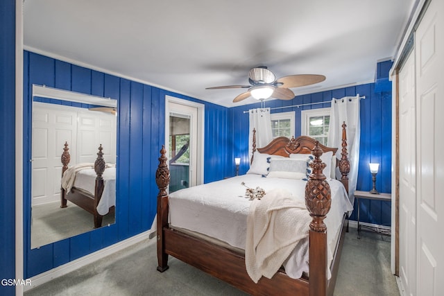 204 Hill St, Gatlinburg, TN 37738 - carpeted bedroom with ceiling fan, a decorative wall, and a closet