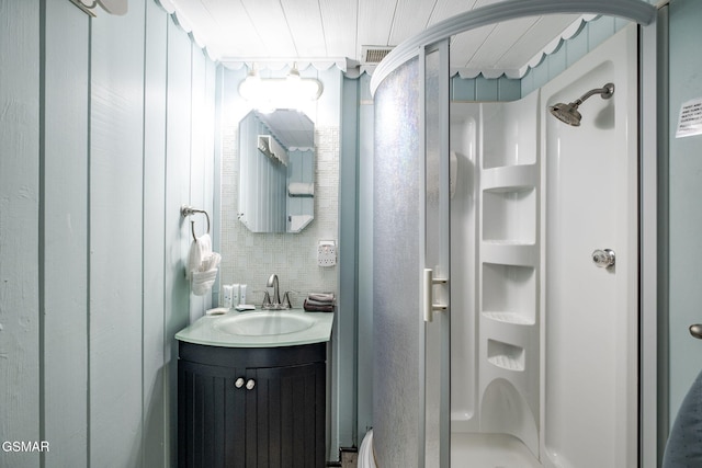 204 Hill St, Gatlinburg, TN 37738 - bathroom featuring a stall shower and vanity