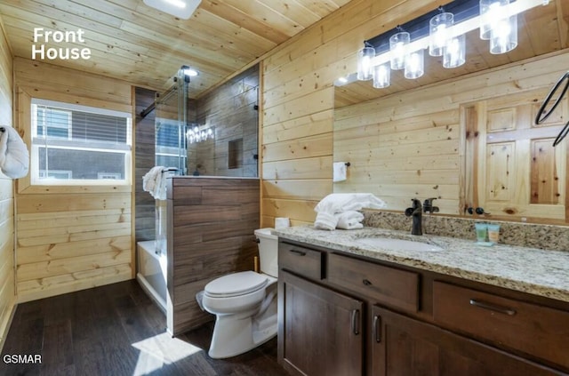 bathroom with wooden ceiling, toilet, wooden walls, wood finished floors, and vanity