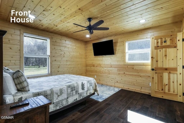 bedroom featuring dark wood-style floors, wood walls, wooden ceiling, and recessed lighting