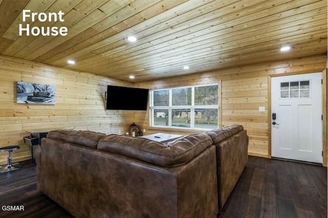 living room featuring wooden ceiling, wooden walls, dark wood-style flooring, and recessed lighting