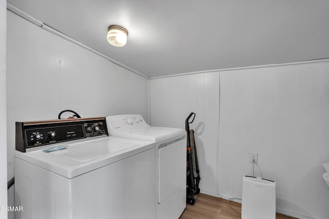 39693975 Wears Valley Rd, Sevierville, TN 37862 - washroom with washer and clothes dryer and light wood-style flooring