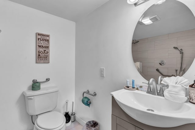 39693975 Wears Valley Rd, Sevierville, TN 37862 - bathroom with toilet, a tile shower, and vanity