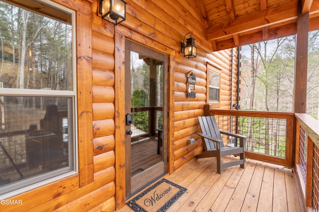 wooden terrace with covered porch