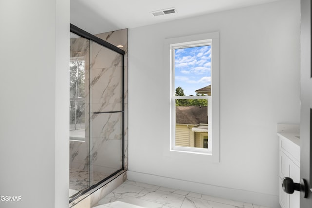 270B W Main St, Dandridge, TN 37725 - bathroom with marble look tiles, vanity, and a marble finish shower