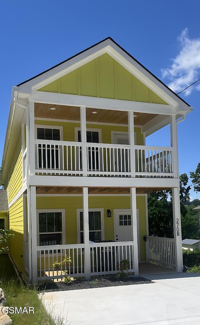270B W Main St, Dandridge, TN 37725 - rear view of house with a balcony, a porch, and board and batten siding