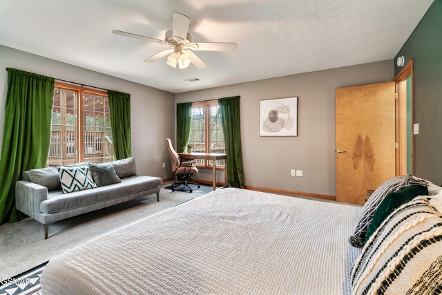 bedroom with carpet floors, baseboards, visible vents, and a ceiling fan