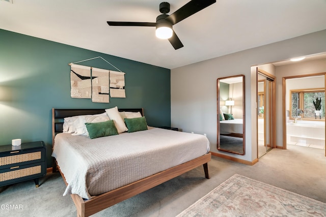 bedroom featuring carpet floors, baseboards, and a ceiling fan