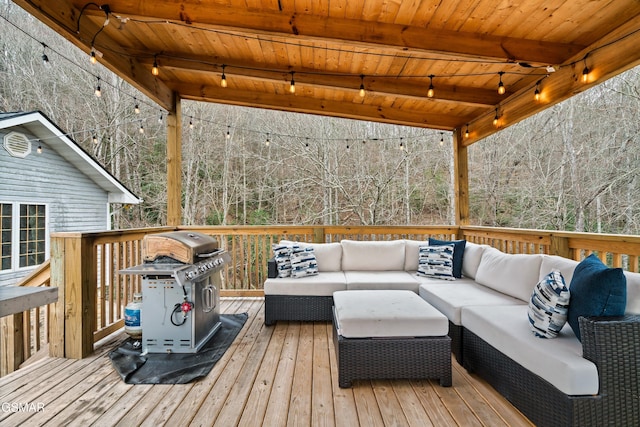 wooden deck featuring outdoor lounge area and area for grilling