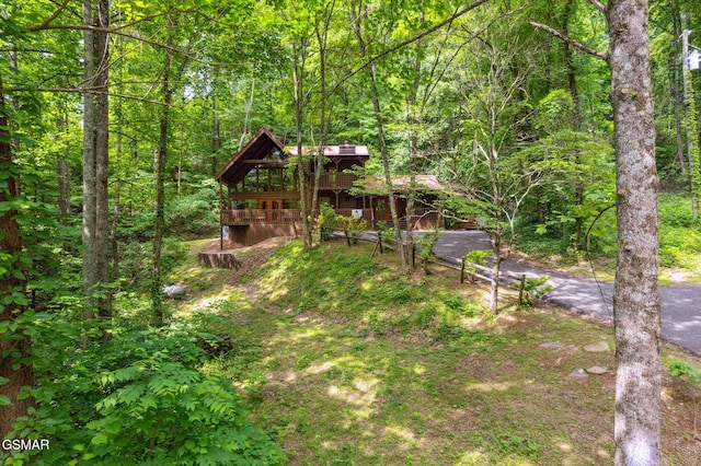 2112 Redmond Way, Sevierville, TN 37876 - view of yard with a view of trees and a wooden deck