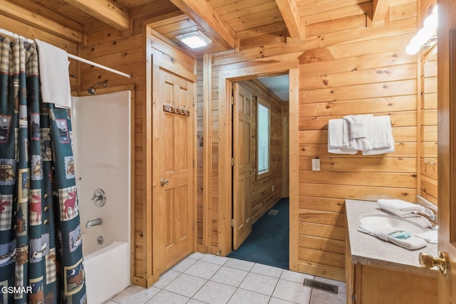2112 Redmond Way, Sevierville, TN 37876 - bathroom featuring wood walls, wood ceiling with exposed beams, tile patterned floors, vanity, and shower / bath combination with curtain
