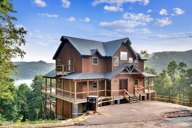 2741 Red Sky Dr, Sevierville, TN 37862 - chalet / cabin with a metal roof, board and batten siding, and a mountain view