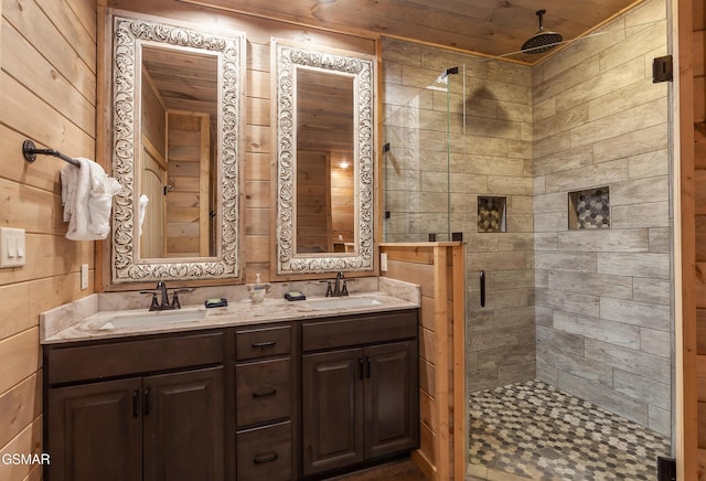 2741 Red Sky Dr, Sevierville, TN 37862 - full bathroom with a stall shower, double vanity, and wooden walls