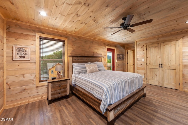 2741 Red Sky Dr, Sevierville, TN 37862 - bedroom featuring wooden ceiling, wood walls, wood finished floors, and recessed lighting