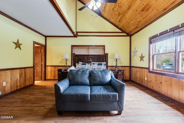 bedroom with wooden ceiling, hardwood / wood-style floors, ceiling fan, and vaulted ceiling