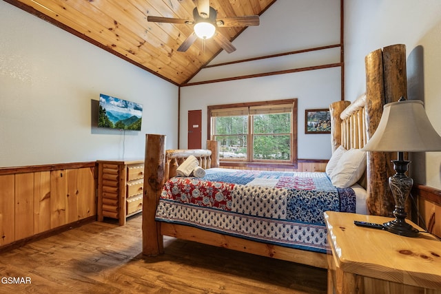 bedroom featuring wood ceiling, vaulted ceiling, crown molding, ceiling fan, and light hardwood / wood-style flooring