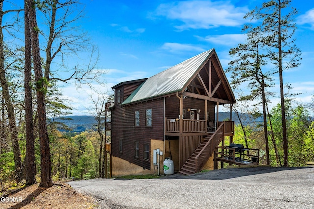 2251 Upper Middle Creek Rd Unit 8, Sevierville, TN 37876 - view of front of property with a metal roof and stairway