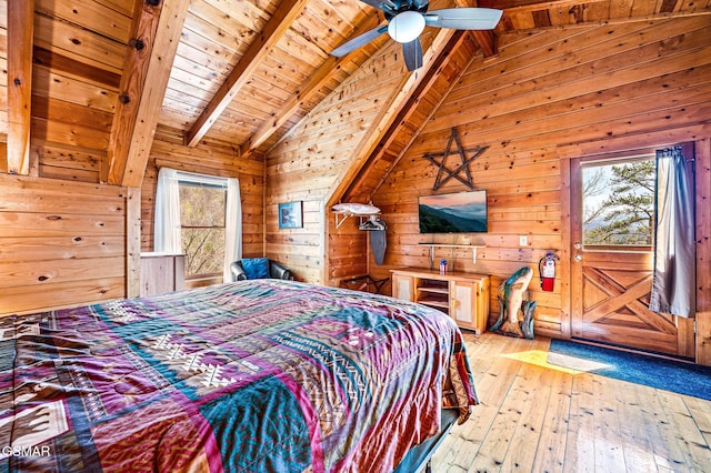 2251 Upper Middle Creek Rd Unit 8, Sevierville, TN 37876 - bedroom with wood ceiling, hardwood / wood-style flooring, wood walls, and access to exterior