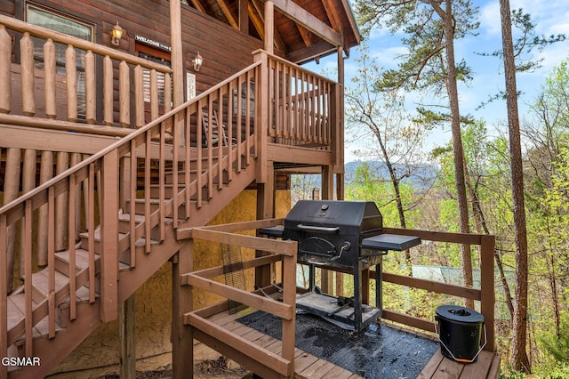 2251 Upper Middle Creek Rd Unit 8, Sevierville, TN 37876 - wooden deck with stairway and grilling area