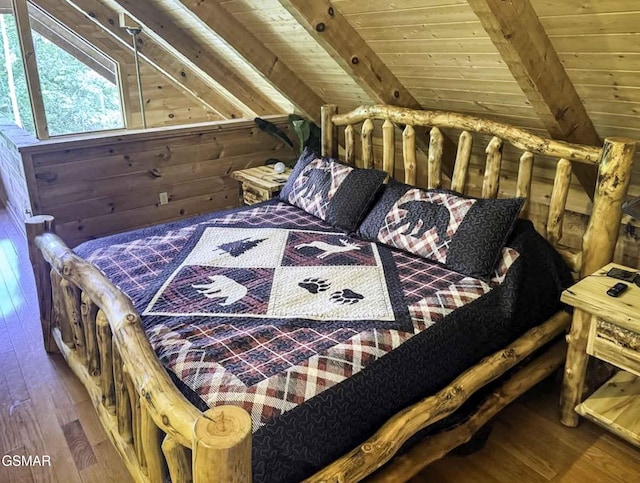 1554 Bear Valley Rd, Sevierville, TN 37876 - bedroom with wood ceiling, hardwood / wood-style floors, and wooden walls