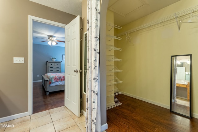 spacious closet featuring tile patterned floors