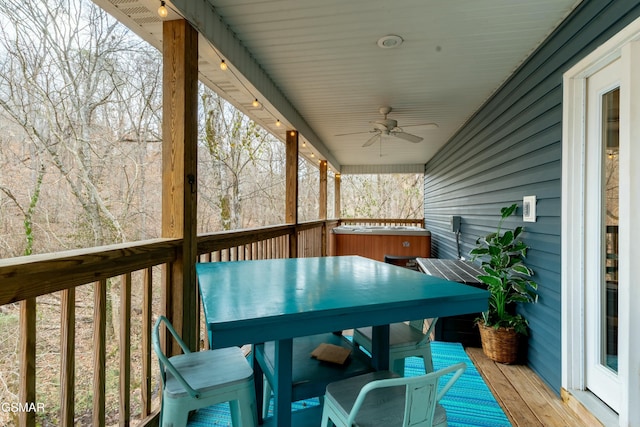 wooden terrace featuring ceiling fan