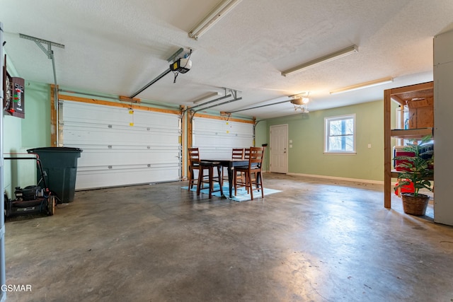 garage featuring a garage door opener