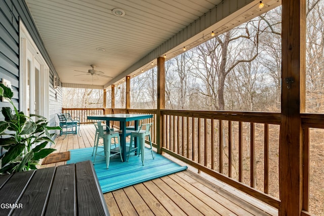 wooden terrace with ceiling fan