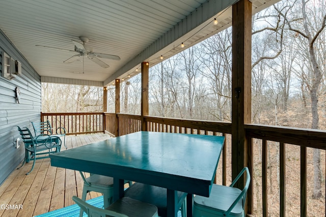 wooden terrace featuring ceiling fan