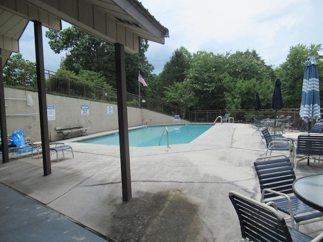 view of swimming pool featuring a patio