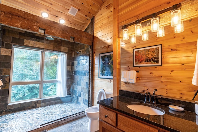 1854 Billard Way, Sevierville, TN 37876 - bathroom with lofted ceiling, a stall shower, vanity, wooden walls, and wood ceiling