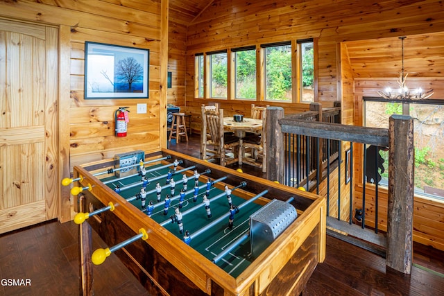 1854 Billard Way, Sevierville, TN 37876 - playroom featuring wooden walls, a chandelier, hardwood / wood-style floors, lofted ceiling, and plenty of natural light