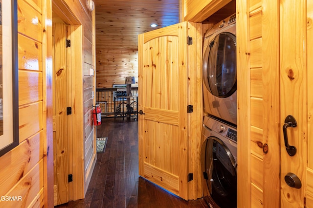1854 Billard Way, Sevierville, TN 37876 - laundry room with stacked washer / drying machine, wood walls, and dark wood-type flooring