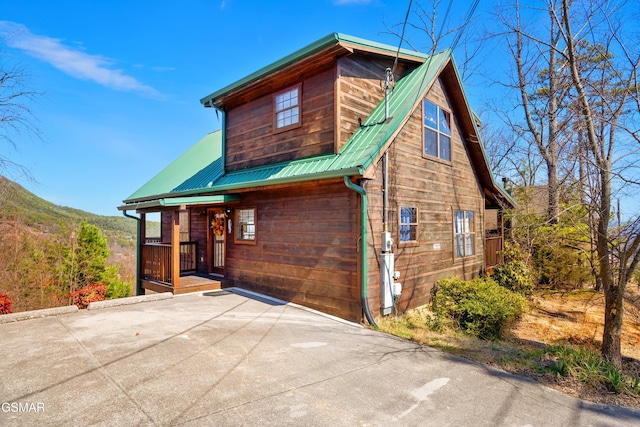 view of front of home with metal roof