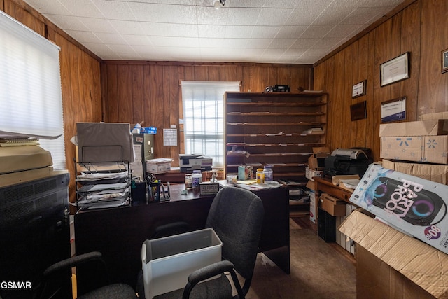 office area featuring wood walls