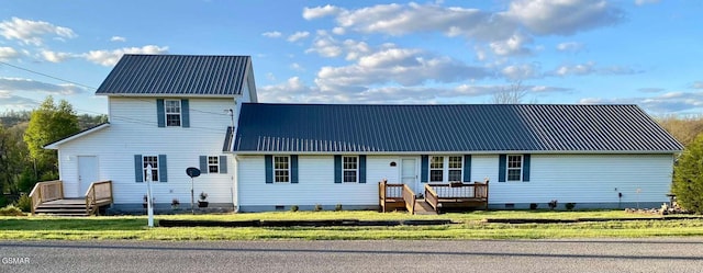 188 Riviera Dr, Newport, TN 37821 - view of front of property featuring crawl space, metal roof, and a front lawn