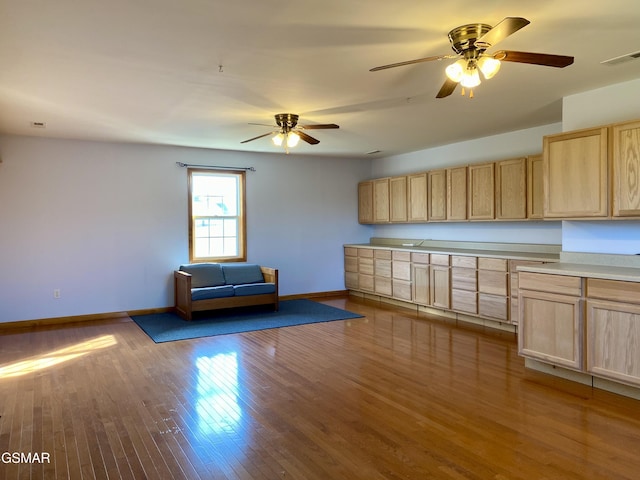 188 Riviera Dr, Newport, TN 37821 - kitchen featuring light brown cabinets, baseboards, visible vents, ceiling fan, and wood finished floors