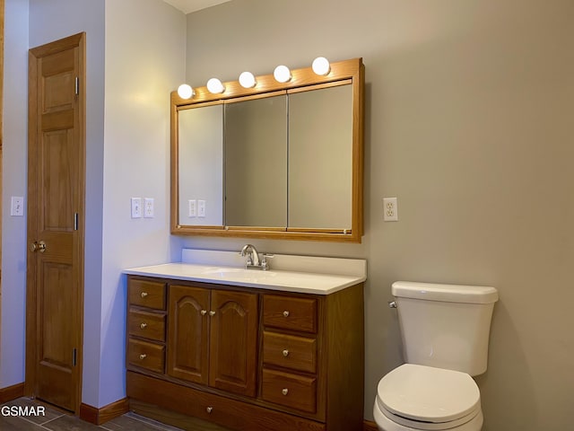 188 Riviera Dr, Newport, TN 37821 - bathroom with tile patterned floors, toilet, vanity, and baseboards