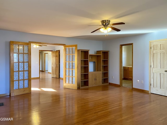 188 Riviera Dr, Newport, TN 37821 - empty room featuring visible vents, baseboards, a ceiling fan, and wood finished floors