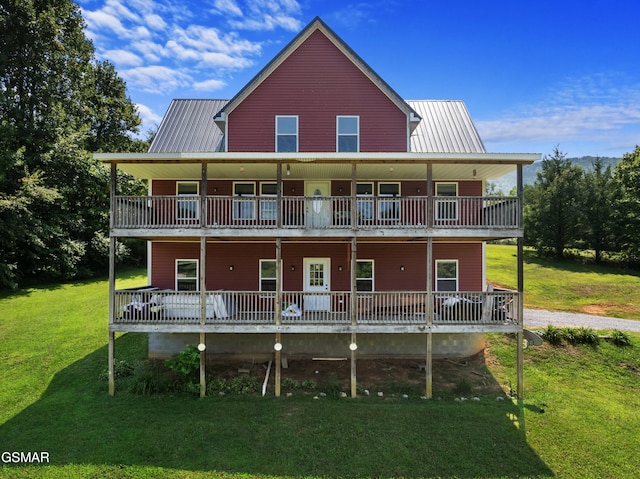 2560 Schisandra Ln, Cosby, TN 37722 - rear view of house featuring a metal roof and a yard