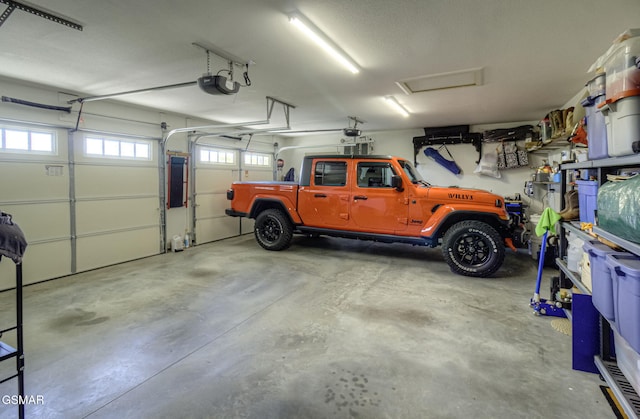 2045 Kings View Loop, Seymour, TN 37865 - garage with electric panel and a garage door opener