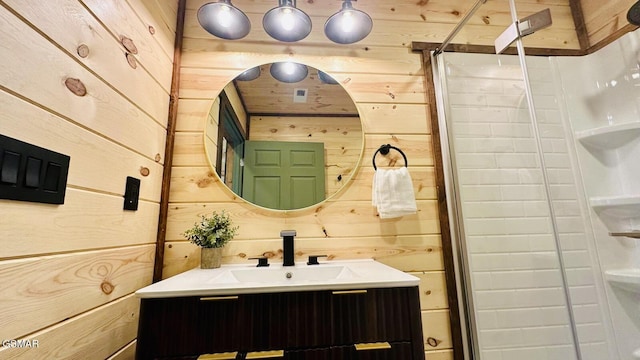 1504 Ginnys Trl, Sevierville, TN 37876 - full bath with wood walls, vanity, and a stall shower