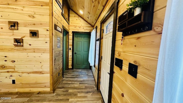 1504 Ginnys Trl, Sevierville, TN 37876 - hallway with wooden walls, wood finished floors, vaulted ceiling, and wooden ceiling