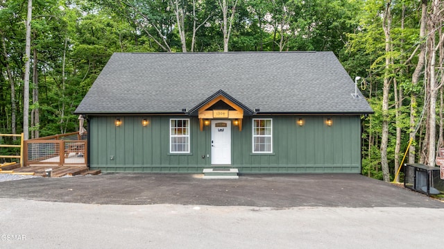 1504 Ginnys Trl, Sevierville, TN 37876 - chalet / cabin with board and batten siding and a shingled roof
