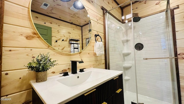 1504 Ginnys Trl, Sevierville, TN 37876 - bathroom with wooden walls, a shower stall, and vanity