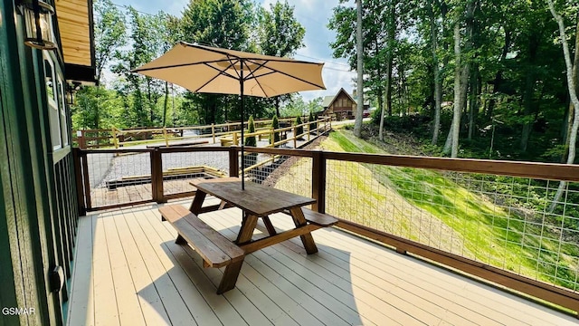 1504 Ginnys Trl, Sevierville, TN 37876 - wooden terrace featuring view of wooded area