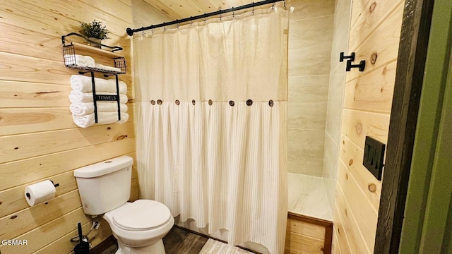 1504 Ginnys Trl, Sevierville, TN 37876 - bathroom with a shower with curtain and wood walls