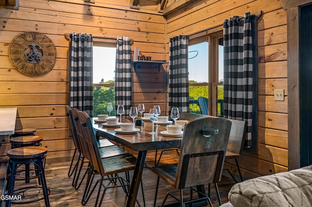 1606 Dove Wing Way, Sevierville, TN 37862 - dining room with wooden walls, healthy amount of natural light, and dark wood-style flooring
