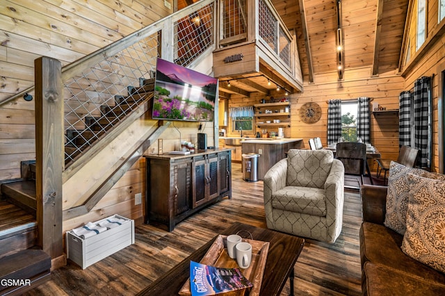 1606 Dove Wing Way, Sevierville, TN 37862 - living room featuring wood walls, dark wood-style flooring, wood ceiling, and stairway